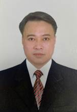 A person in a suit and tieAI-generated content may be incorrect.